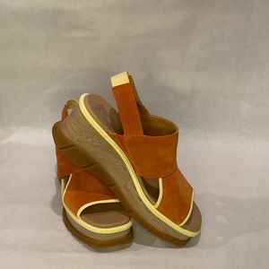 Woman’s sandal, yellow, and orange color